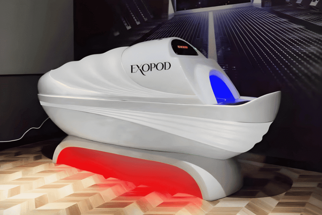 EXOPOD recovery wellness pod with blue light therapy and infrared — stacked modalities in one session