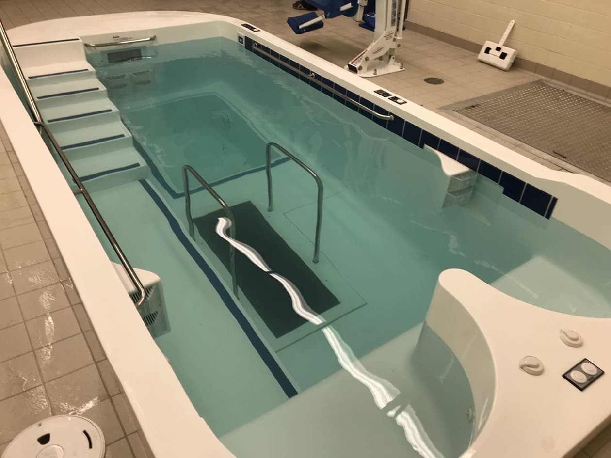 SwimEx Triton therapy pool — clinical-grade hydrotherapy